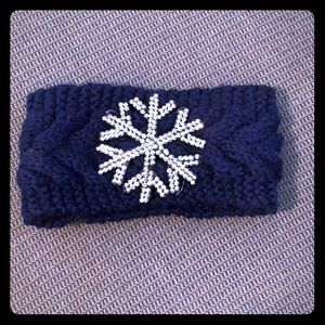 Warm fuzzy head band with bling snow flake on it